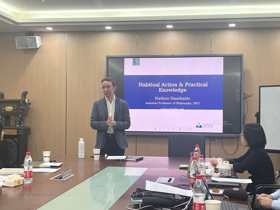 A group of people in a meetingDescription automatically generated A group of people in a meetingDescription automatically generated